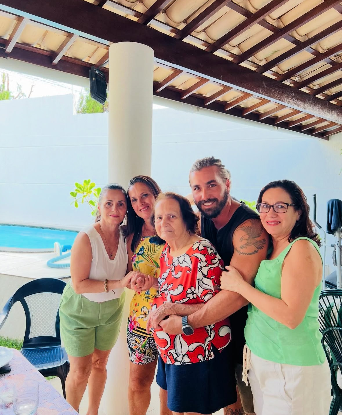 Nelson with his mom and family in Brazil