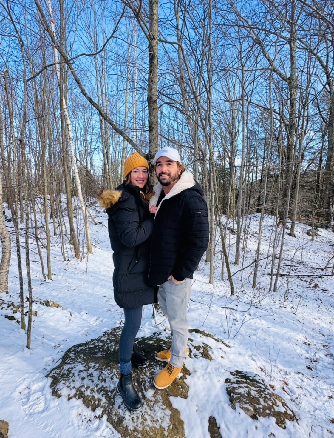 Nelson and his girlfriend on a snowy winter hike